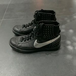 Nike black and silver high tops